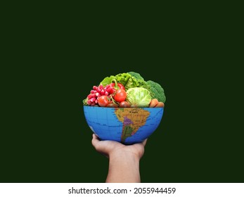 World food day concept: Human hands holding a globe with vegetables. 3d rendering - Powered by Shutterstock