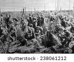 World War I, American soldiers of the 2nd Battalion, 307th Regiment await orders to advance north of La Four de Paris, U.S. Signal Corps photograph, 1918