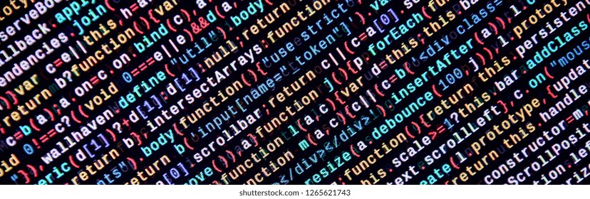 Writing programming code on laptop. Digital binary data on computer screen