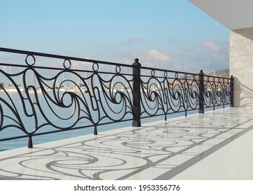 Wrought iron railing. 3D render for project. Forging metal. Balcony. Terrace. Architecture. Luxury hotel. Sea view. Iron fences. White handrails with gold decor. Summer vacations. Blacksmithing.