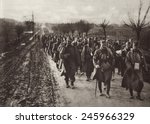 WWI. An Austrian invading column marching through the flat country of Eastern Europe. Ca. 1914-17.