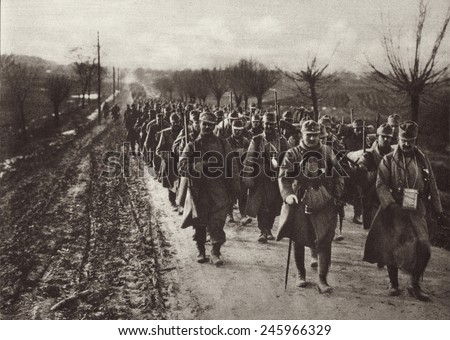 WWI. An Austrian invading column marching through the flat country of Eastern Europe. Ca. 1914-17.