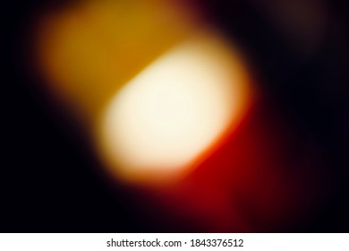 Yellow abstract effect on black background. Illustration. 00s. Old analog photo effect. Lens flare texture