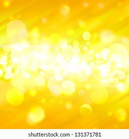 Yellow bokeh abstract background with rays