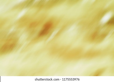 Yellow brown light rays blurred abstract background design