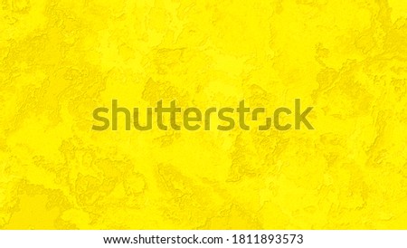 Yellow cement wall texture background.