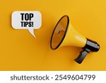 Yellow Megaphone with Top Tips Sign Speech Clouds Chat Bubble on a yellow background. 3d Rendering