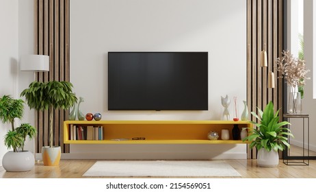 Yellow Shelf And TV In Modern Living Room Have Empty White Wall Background.3D Rendering