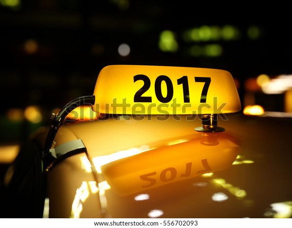 Yellow\
taxi sign 2017 year at night. Taxi car on the street at night. Taxi\
car new 2017 year roof sign on bokeh\
background