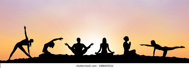 Yoga Group Silhouette At Sunset