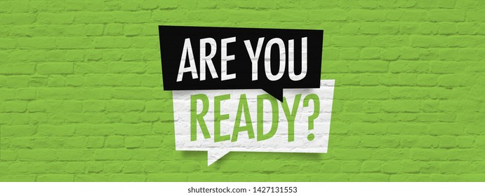 " Are you ready ? “ on green brick wall