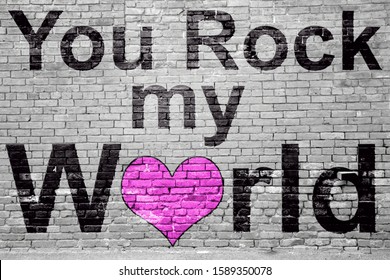 You Rock My World Lettering Saying Graffiti On Brick Wall