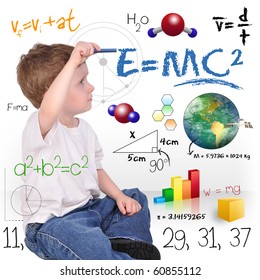 A Young Boy Child Is Writing Out Math And Science Equations And Formulas. He Is Sitting On The Floor On A White Background. Use It For A School, Study Or Learning Concept.