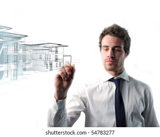 young caucasian man drawing house - Powered by Shutterstock