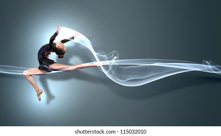 Young Cute Woman In Gymnast Suit Show Athletic Skill On Black Background