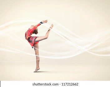 Young Cute Woman In Gymnast Suit Show Athletic Skill On White Background