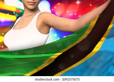 young girl is holding Tanzania flag in front of her on the  party lights - flag concept 3d illustration