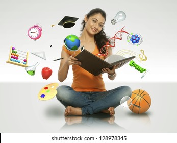 young girl reading book with flying object - Powered by Shutterstock