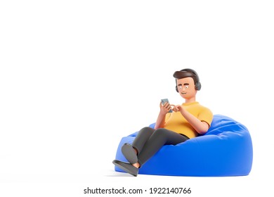 Young Happy Cartoon Character Man In Yellow T-shirt Relax At Bean Bag Armchair And Listening Music By Headphones And Smartphone Isolated Over White Background. 3d Render Illustration