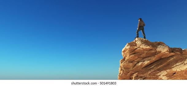 Young Man At The Top Of The Mountain On Blue Background Admiring The View. This Is A 3d Render Illustration