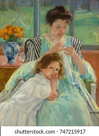 Young Mother Sewing, By Mary Cassatt, 1900, French Impressionist Painting, Oil On Canvas. Painted In Soft Greens, A Mother Adjusts Her Task To Accommodate The Presence Of The Young Child