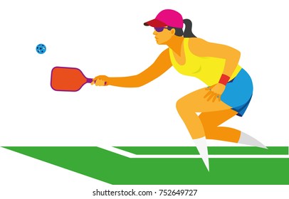 A Young Woman In A Baseball Cap Beats The Ball Playing Pickleball