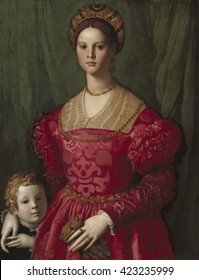 A Young Woman And Her Little Boy, By Agnolo Bronzino, C. 1540, Italian Renaissance Painting, Oil On Canvas. A Noblewoman Of The Court Of Cosimo I De' Medici, Duke Of Florence, In Ornate And Costly At