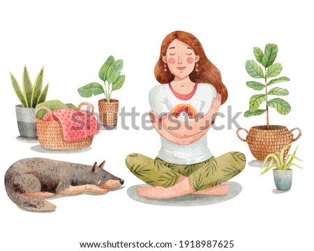 A young woman sitting in yoga pose and hugging herself. A girl meditating on the floor surrounded by indoor plants. A dog sleeping beside her. Hygge lifestyle. Love your body. 