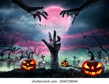 Zombie Hands Rising Out Of A Graveyard With Full Moon And Halloween Pumpkins - Contain 3d Illustration - Powered by Shutterstock