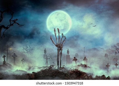 Zombie skeleton hand rise from the grave. Halloween design with zombie graveyard - Powered by Shutterstock