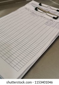 white​ notebook​ in​ office​