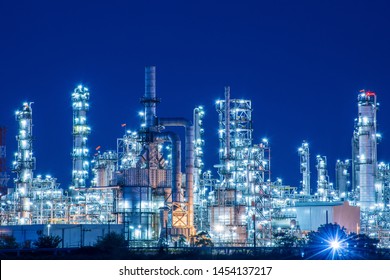 Oil​ Refinery​ And​ Petrochemical​ Plant​ ​industry, Natural​ ​gas​ ​storage​ ​tank​ Pipelines​ ​street​ With​ ​blue​ ​night​ Sky​ ​background.