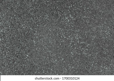 Washed granite gravel, chipped flat little stones. Smooth small marble pebbles for paper web site texture backdrop. Rough natural quartz crumbs on concrete panel. Cement wall border outdoor city patio