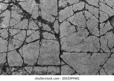Old aged damaged marble bumpy uneven blocks. Trip pitted grunge granite tile cobble. Cragged grimy retro cranny frayed run track. Crannied dirtied shabby smashed gaping rustic big holes for 3d design