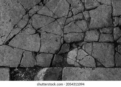 Old aged damaged marble bumpy uneven blocks. Trip pitted grunge granite tile cobble. Cragged grimy retro cranny frayed run track. Crannied dirtied shabby smashed gaping rustic big holes for 3d design