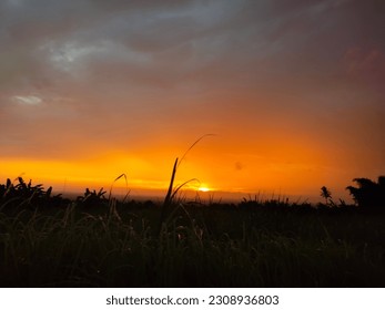 The Sun's daily descent below the horizon as a result of the rotation of the Earth is known as sunset or dusk. as seen from every location on Earth