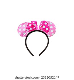 Mouse-ear headband with pink polka dots on a white background. - Shutterstock ID 2312052149