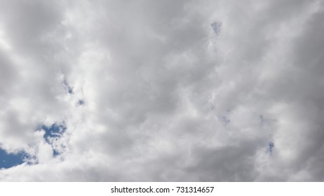 The sky is overspread with clouds.