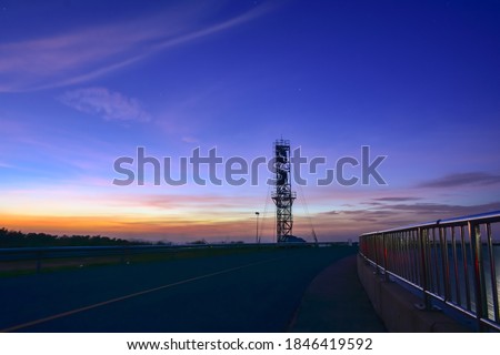 The​ view​s​ beautiful​ sky​ twilight​ road​ on​ Reservoir​ Lamtakong​ and​ background​ outdoor​ relax​ holiday​ travel​ concept​, landmark​ Nakhon​ratchasima, Thailand​ 2020​