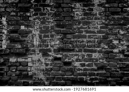 Texture of old dark scary dirty crumbling brick wall of ancient city. Uneven pitted surface of the brickwork of the damp basement with holes and worn. Decayed burnt brickwall background for 3D design Stock photo © 