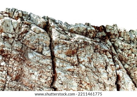 Grunge old rustic vintage relief of rural stony cliff. Uneven aged quarry bluff of geology hard strata. Crannied bumpy stiff tectonic land hillside.Dirtied shabby rough craggy medieval country design