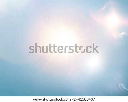 The​ light​ blue​ back​ground​ image​ has​ a​ white​ beam​, a​ pink​ beam​ of​ light​ shining​ through​ it​ for​ Graphics​