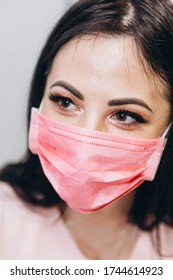 01.02.2020 Kyiv, Ukraine: Portrait Of Female Doctor In Pink Mask Very Close To Eye View