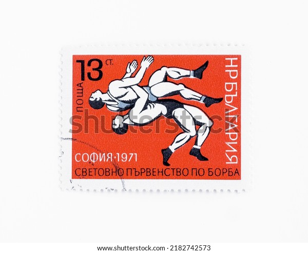 01.03.2021 Istanbul Turkey. A stamp printed in\
Bulgaria shows Greco-Roman style Wrestling with the inscription and\
name of series. European Wrestling Championship Sofia circa 1971\
Cancelled used stamp