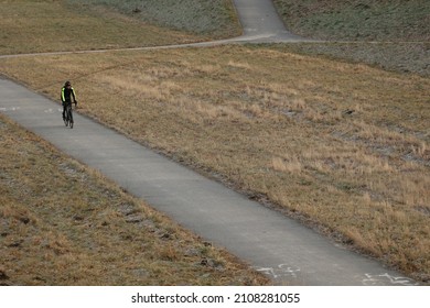 01.15.2022 Wroclaw, Poland, People Are Riding The Bike Path By Bike In Winter.