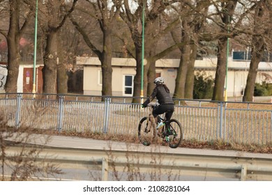 01.15.2022 Wroclaw, Poland, People Are Riding The Bike Path By Bike In Winter.