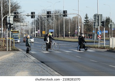 01.15.2022 Wroclaw, Poland, People Are Riding The Bike Path By Bike In Winter.