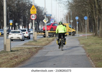 01.15.2022 Wroclaw, Poland, People Are Riding The Bike Path By Bike In Winter.