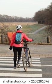 01.15.2022 Wroclaw, Poland, People Are Riding The Bike Path By Bike In Winter.