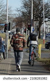 01.15.2022 Wroclaw, Poland, People Are Riding The Bike Path By Bike In Winter.